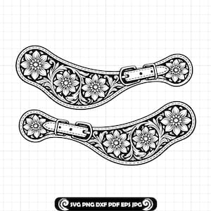 Op de afbeelding: Zwart-wit illustratie van twee spoorriemen met bloemenmotief. Elke riem heeft een gesp en gedetailleerde bloempatronen. Het ontwerp is geschikt voor knutselprojecten.