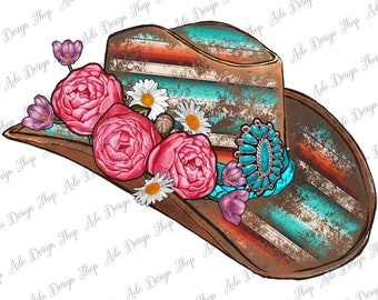 May include: A brown and turquoise cowboy hat with a distressed look. The hat is decorated with pink and white flowers and a turquoise and silver concho.