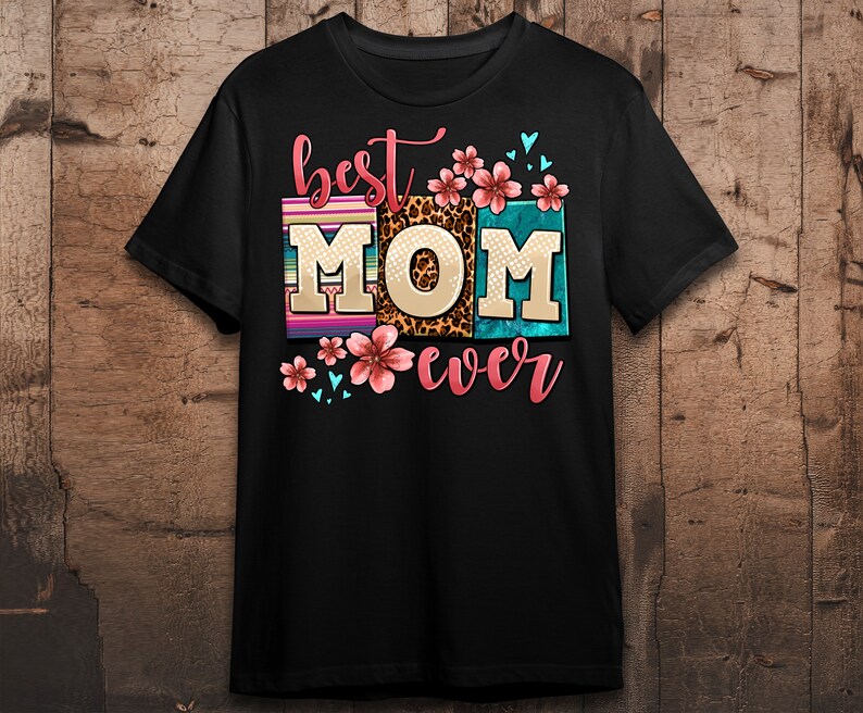 May include: Black t-shirt with the text "best MOM ever" in colorful letters with floral and animal print accents.