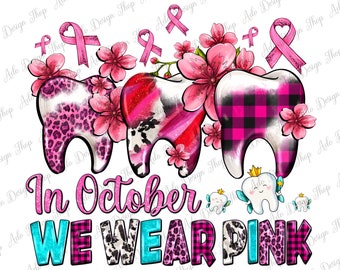 Op de afbeelding: Drie roze tanden met verschillende patronen, omringd door roze bloemen en roze linten. De tekst "In October WE WEAR PINK" staat onder de tanden.