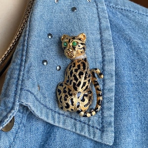 Vintage D’Orlan cat brooch green eyes, gold and black body with clear rhinestone collar