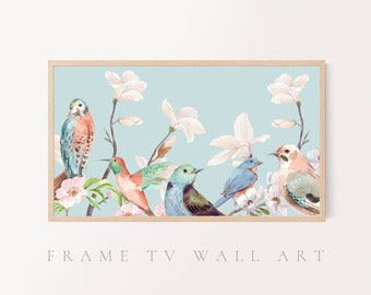 May include: A watercolor painting of a blue sky with white magnolia flowers and five colorful birds. The birds are perched on the branches of the magnolia trees. The birds are a blue jay, a hummingbird, a bluebird, a kestrel, and a cardinal.