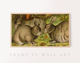 May include: Three brown rabbits with long ears are depicted in a vintage illustration. The rabbits are surrounded by green foliage and flowers.