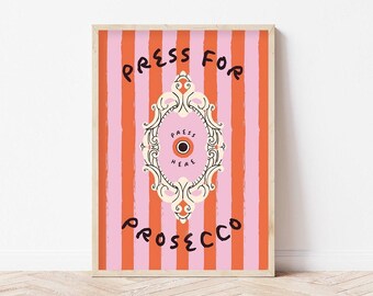 May include: A pink and orange striped poster with the text "Press for Prosecco" and a decorative, ornate, gold-colored frame with the text "Press Here" inside.