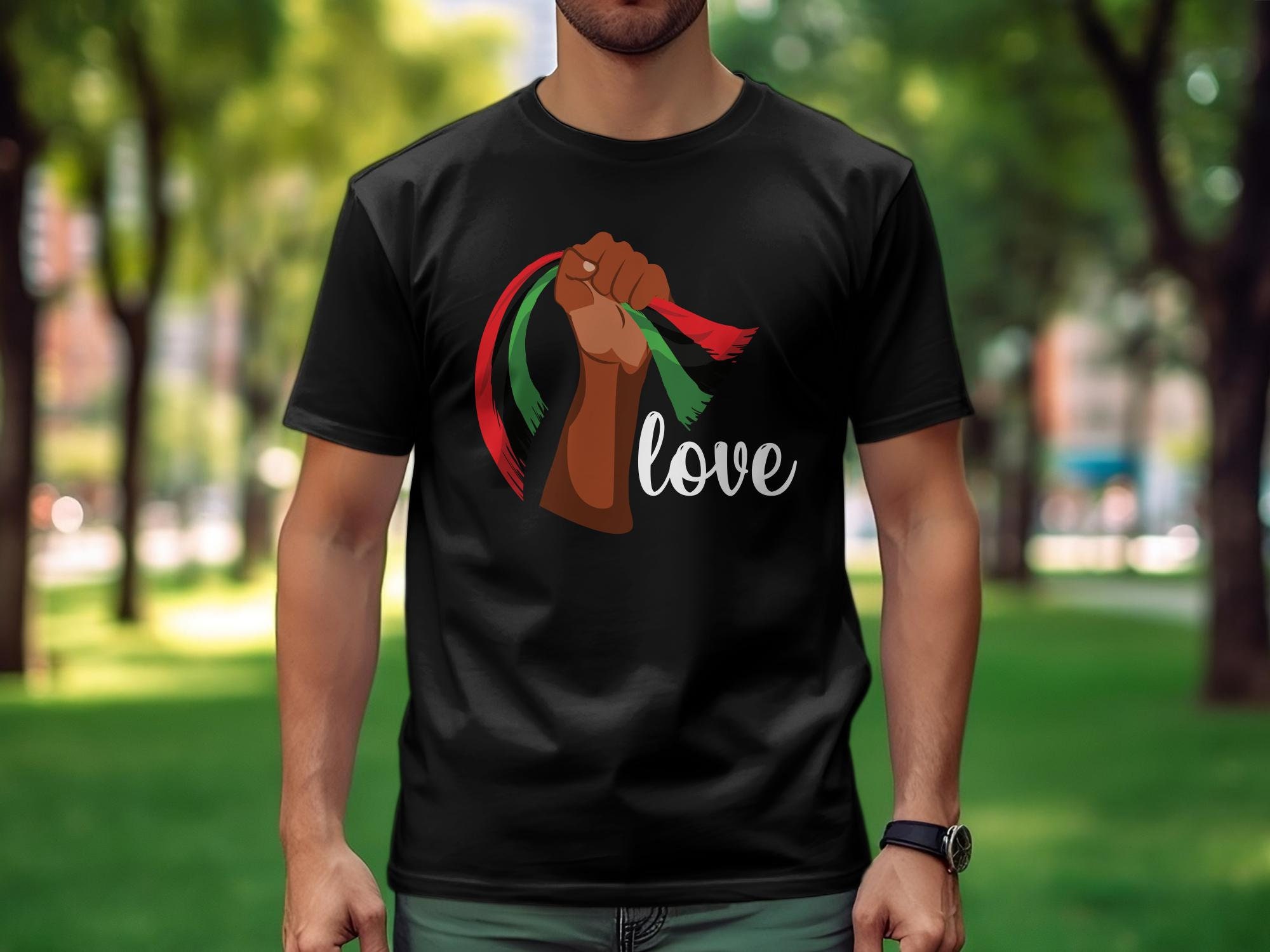 Empowerment Graphic Tee, Raised Fist with Flag Colors, Unisex Statement Shirt, Bold Political Symbol Apparel, Unity and Resistance Shirt