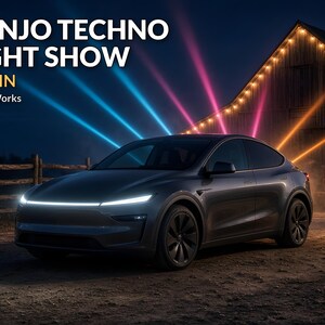 May include: A dark gray electric vehicle parked at night in front of a barn with string lights. Text reads BANJO TECHNO LIGHT SHOW, ~4 MIN, and SecristWorks. Bright blue, pink, and orange light beams project upward from behind the car.