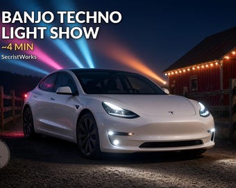 May include: A white electric sedan with illuminated headlights and fog lights parked outdoors at night. The text BANJO TECHNO LIGHT SHOW ~4 MIN SecristWorks is visible above the car, with blue and pink light beams projecting into the sky.