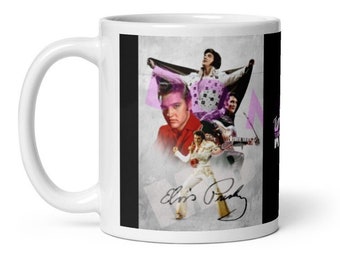 May include: White ceramic mug featuring a collage of Elvis Presley images in various poses and outfits. The mug includes Elvis's signature and a black vertical stripe on the side.