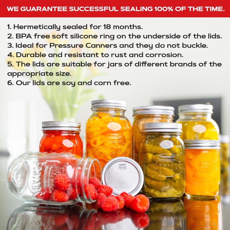 May include: Six glass jars with silver lids, filled with various preserved foods, including pickles, peppers, and fruit. The jars are arranged on a dark surface with red raspberries scattered around them. The text "WE GUARANTEE SUCCESSFUL SEALING 100% OF THE TIME." is visible at the top of the image.