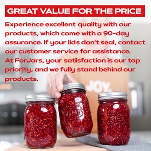 May include: Three glass jars filled with red raspberry jam. The jars have silver lids and are sitting on a wooden surface. The text "JOY" is visible in the background.