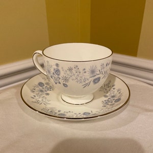 Set of 4, Wedgwood China Cup and Saucer, in the Belle Fleur Pattern , blue and white Floral with platinum trim. Cup and Saucer , set of 4