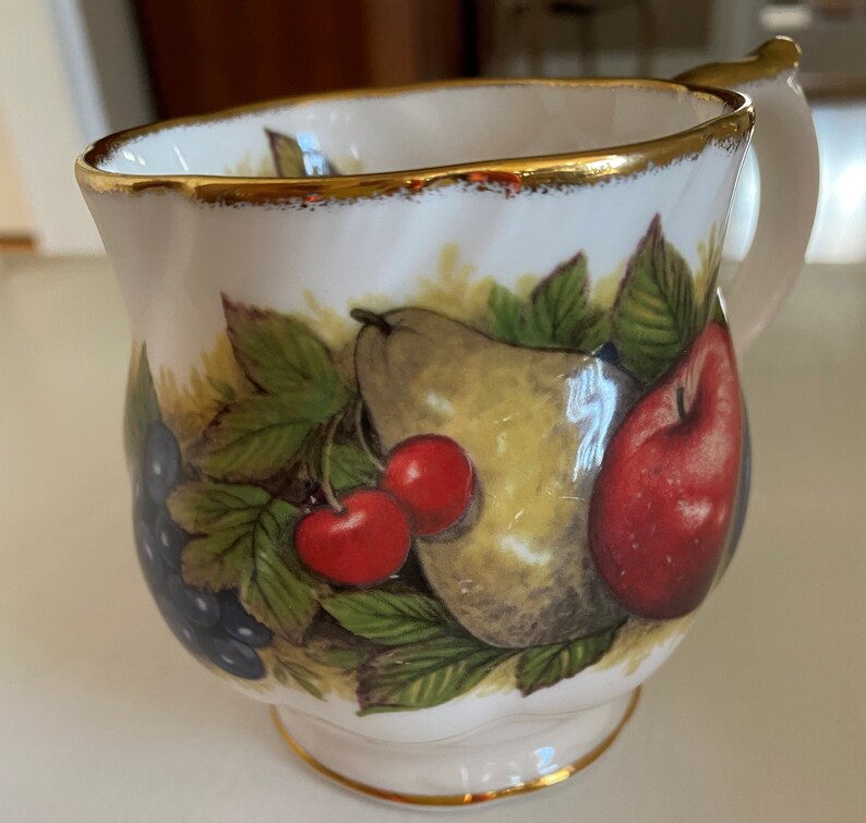 A Churchill Brand, Queen's Fine Bone China, Antique Fruit, Teacup