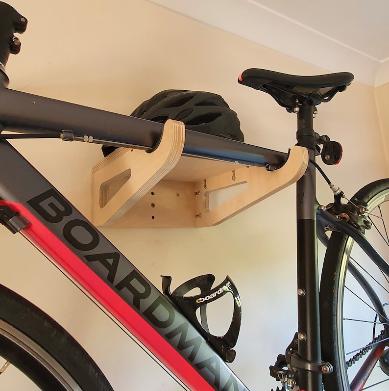 Yes! you can hang the bike vertically...