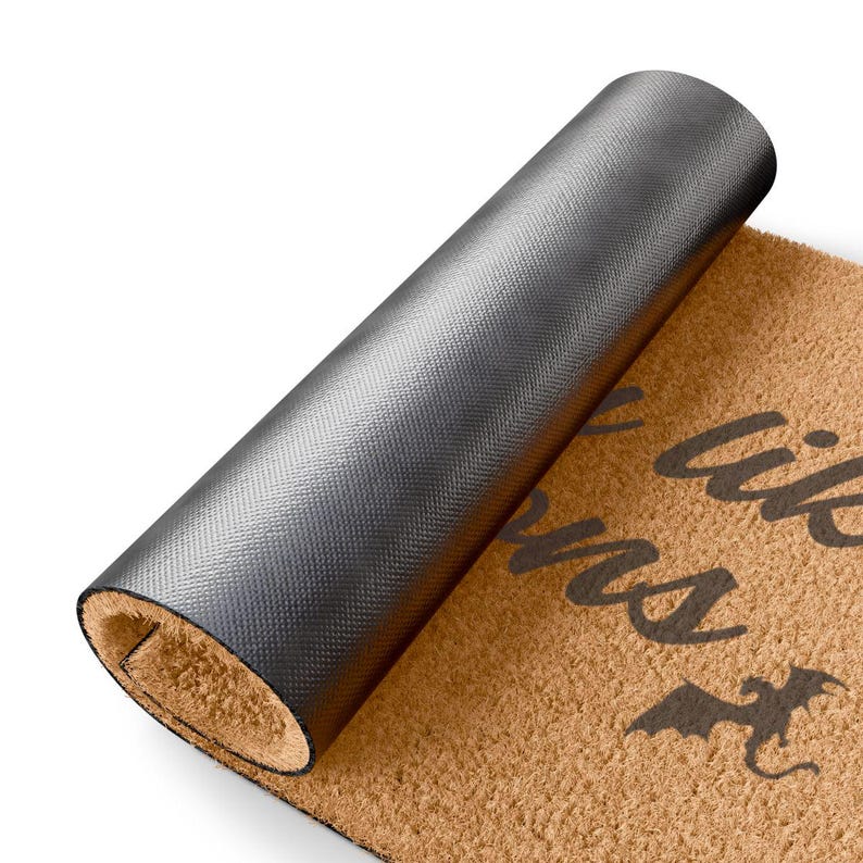 May include: A brown coir doormat with the text "I like you a lot, but I love my dragons" and a black dragon silhouette.