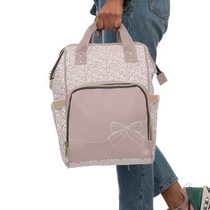 Kokette Windeltasche | Windelrucksack | Windeltasche Mädchen | Blumen-Windeltasche | Bögen | Weiche rosa Babytasche Bild 9