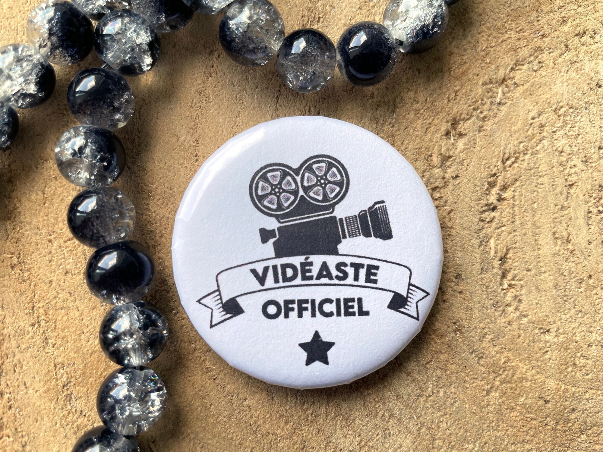 Black and white videographer job badge. Wedding video badge