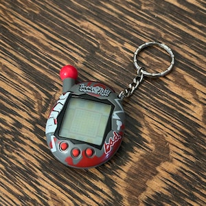Tamagotchi Connection V4 Grey Punk 2007 Bandai Wiz