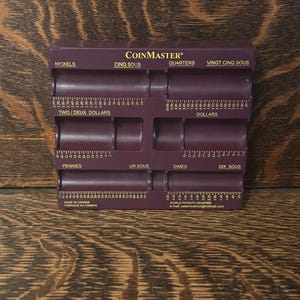 May include: A set of three ceramic mugs with a speckled, matte finish in cream, light grey, and dark grey. Each mug has a simple, minimalist design and a rounded handle.