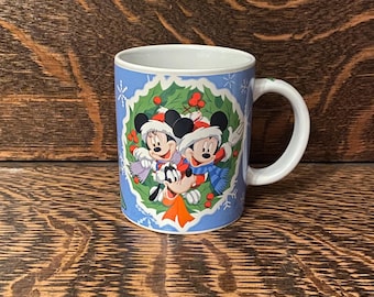 Taza navideña vintage de porcelana de Mickey Mouse, Minnie Mouse y Goofy de Disney