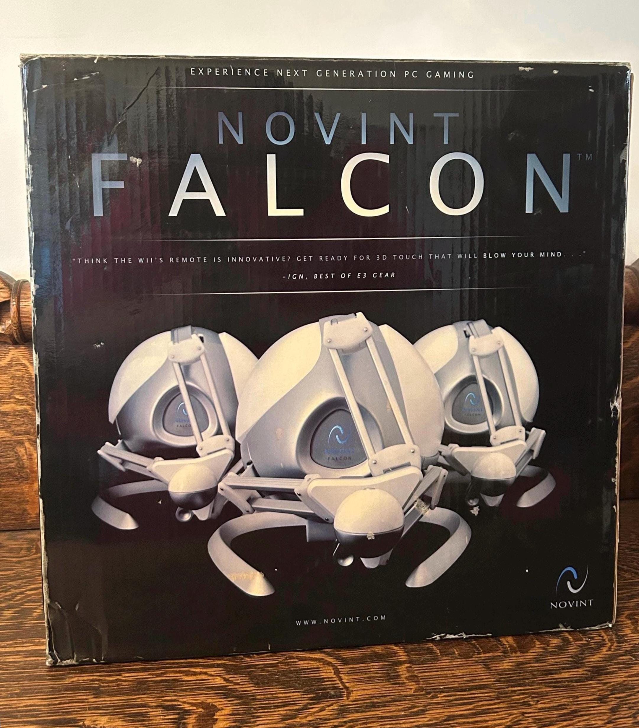 Novint Falcon - PC用ゲームコントローラー This haptic feedback PC game controller is BIZARRE…and kinda