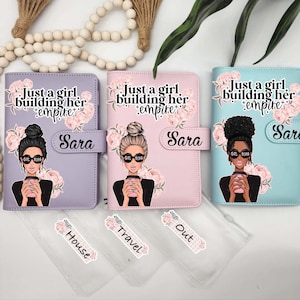 May include: Three planner binders in lavender, pink, and teal, each with a floral design and the text "Just a girl building her empire." Each binder has a graphic of a woman with sunglasses and the name "Sara."