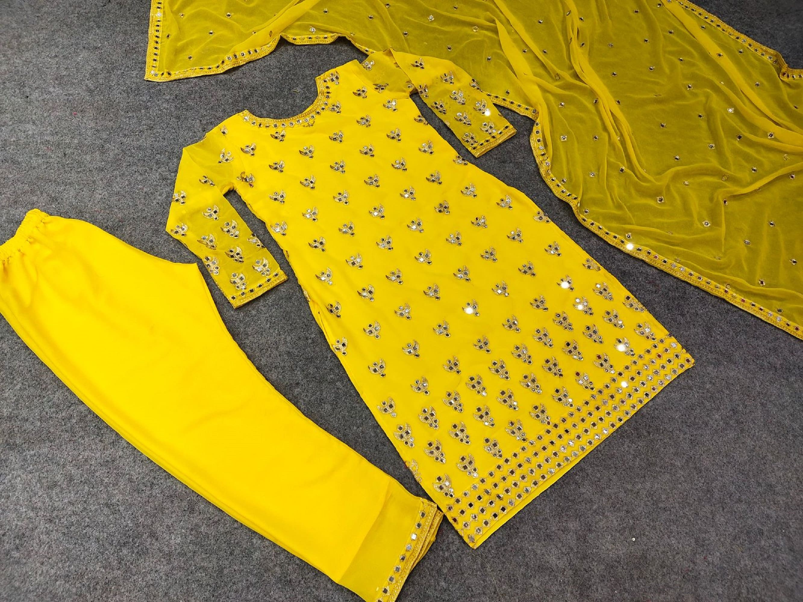 Gleaming Yellow Mirror Chikankari Kurta With Blue Denim Pants