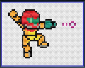 May include: A pixelated video game character, Samus Aran, from the Metroid series, is wearing a yellow and red power suit and holding a green weapon. She is firing a pink energy beam.