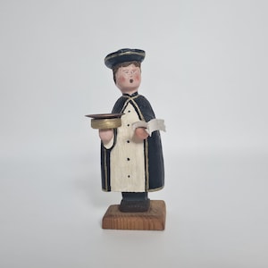 Vintage retro Erzgebirge wooden Hand carved Figurine Caroler with sheet of music and and a candlestick. Collectible item #239