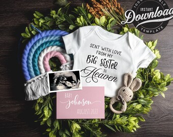 May include: A white onesie with the text "Sent with love from my Big Sister in Heaven". A pink card with the text "Baby Johnson August 2022" is next to a small crocheted bunny with a wooden ring. A rainbow-colored yarn rainbow is in the background.