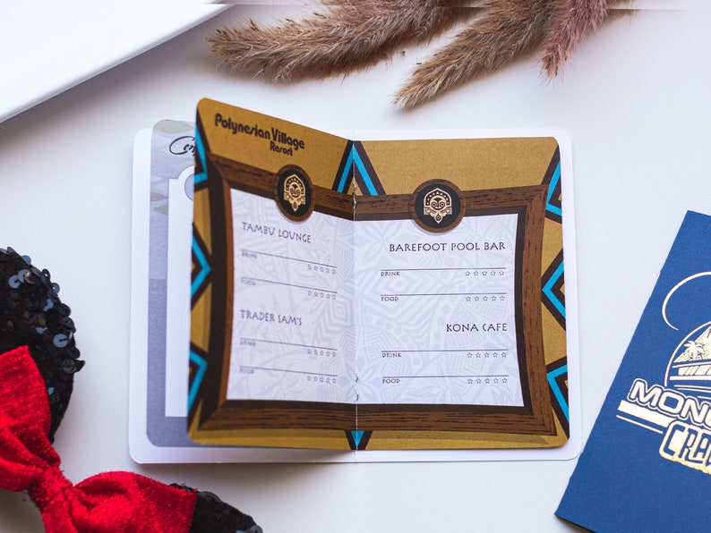May include: A brown and gold card with a list of restaurants at the Polynesian Village Resort. The restaurants listed are Tambu Lounge, Trader Sam's, Barefoot Pool Bar, and Kona Cafe.
