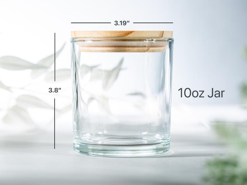 May include: A clear glass jar with a wooden lid. The jar is 3.8 inches tall and 3.19 inches wide. It is labeled "10oz Jar".