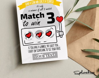May include: A gray and white scratch-off card with a red heart design. The card says "Grab a coin and give it a scratch. It's only a winner if all 3 match. Match 3 to win."  The card also says "If you have a winner, yay lucky you... Carry on scratching to see your prize."  The card has a space for "Your Text".