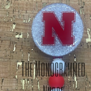 University of Nebraska- Lincoln Cornhuskers badge reel with silicone beads and metal spacers