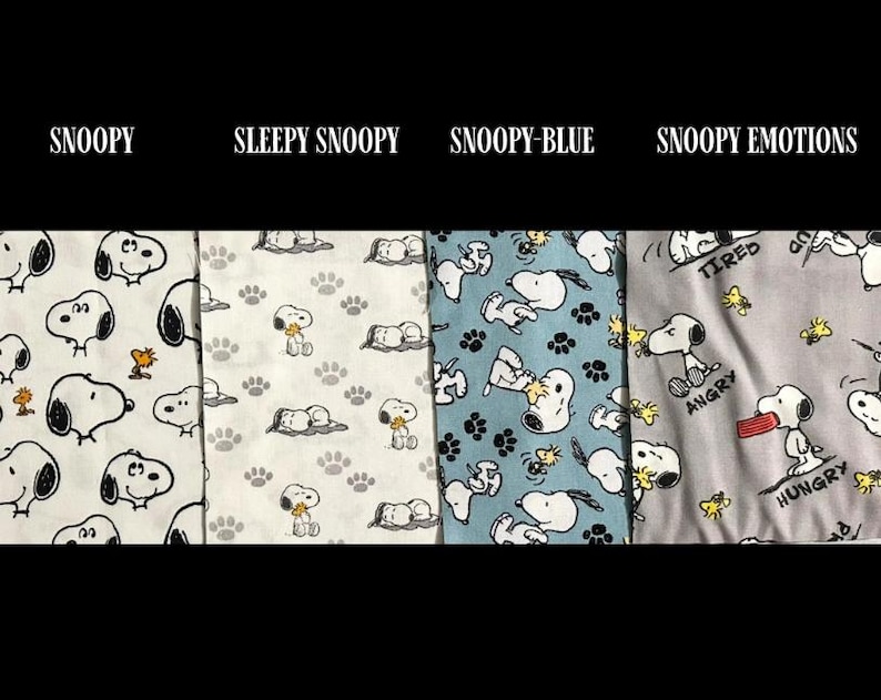 May include: Four fabric patterns featuring Snoopy. The first pattern is white with Snoopy and Woodstock. The second is white with Snoopy paw prints. The third is blue with Snoopy. The fourth is grey with Snoopy and the words "Tired", "Angry", and "Hungry".
