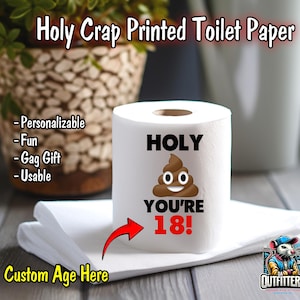 May include: White toilet paper roll with the text "HOLY YOU'RE 18!" and a poop emoji. The words "Holy Crap Printed Toilet Paper" are at the top. The words "Personalizable, Fun, Gag Gift, Usable" are on the left. A red arrow points to the words "Custom Age Here".