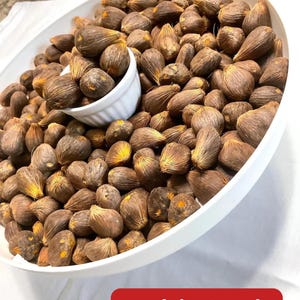 Afrikanische Bio Palmnnüsse - Geknackt & Ungeknackt