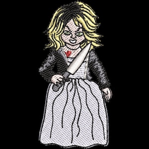 May include: A white dress with a black and white pattern, a black jacket, and a knife. The doll has blonde hair and a red heart on her chest.