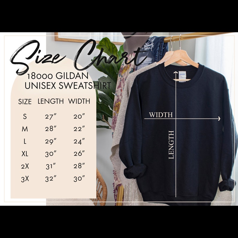 May include: Size chart for a unisex Gildan sweatshirt. The chart shows the length and width in inches for sizes S, M, L, XL, 2X, and 3X. A black sweatshirt is shown hanging on a hanger.