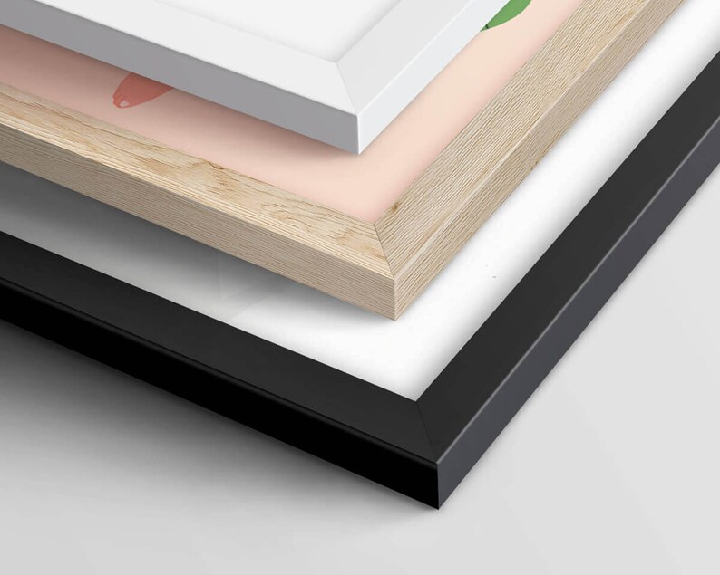 May include: Three picture frames stacked on top of each other. The top frame is white, the middle frame is light wood, and the bottom frame is black.