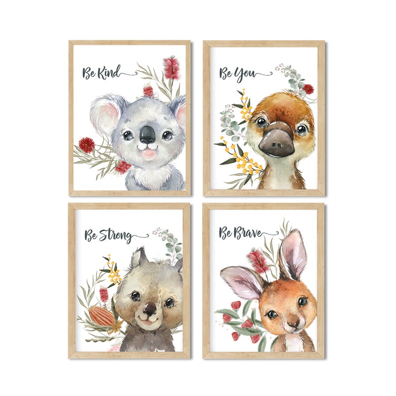 May include: Set of four framed prints featuring watercolor illustrations of Australian animals with inspirational messages. The prints feature a koala, platypus, wombat, and kangaroo with the words "Be Kind", "Be You", "Be Strong", and "Be Brave" respectively.