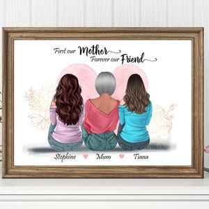 May include: A framed print with a white background featuring three women sitting back to back. The women have brown, gray, and brown hair. The text "First our Mother Forever our Friend" is at the top of the print. The names "Stephine", "Mum", and "Tiana" are written below the women.