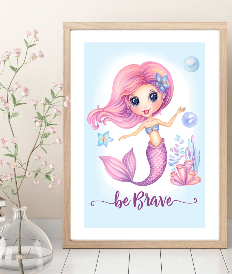 May include: A watercolor illustration of a pink-haired mermaid with a purple tail, surrounded by bubbles and coral. The text "be brave" is written in purple cursive below the mermaid.