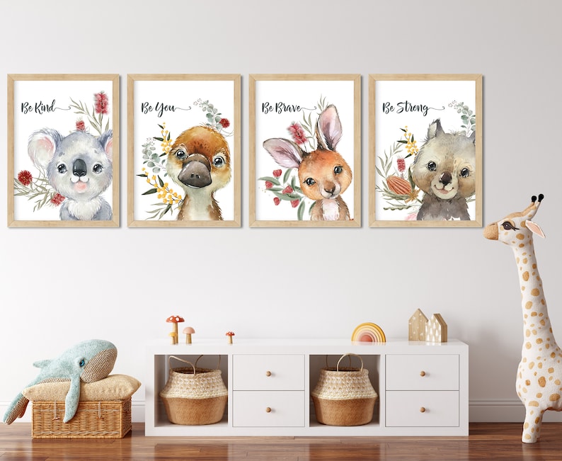 May include: Four framed prints with watercolor illustrations of Australian animals, each with a motivational phrase. The prints feature a koala, platypus, kangaroo, and wombat. The phrases are "Be Kind", "Be You", "Be Brave", and "Be Strong".
