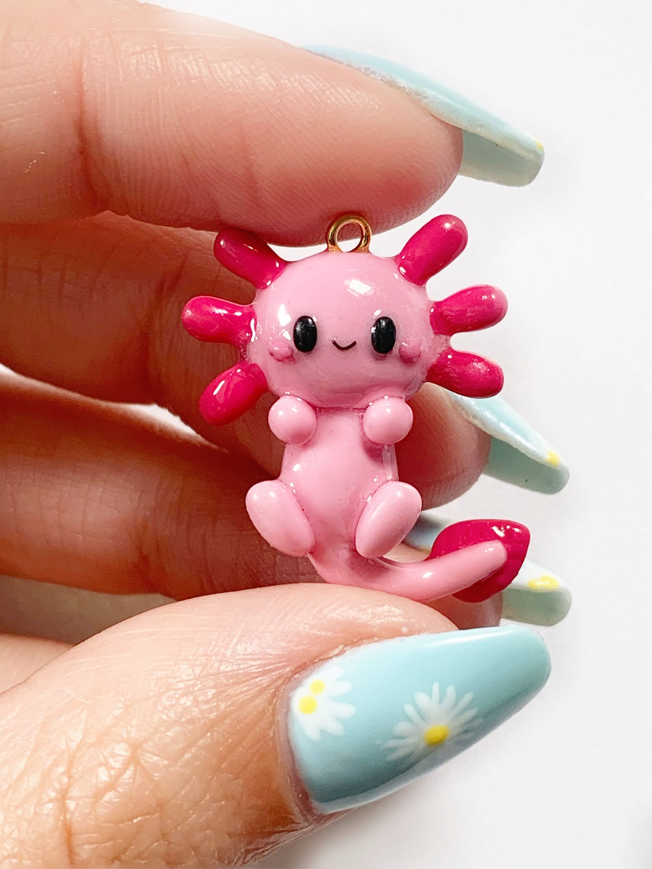 I made some axolotl charms - I used Fimo effects rose quartz and