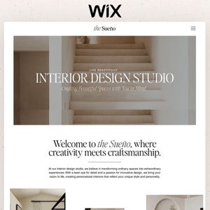 May include: A website landing page for an interior design studio named the Sue&ntilde;o. The page features a large hero image of a staircase, the text INTERIOR DESIGN STUDIO, and the headline Welcome to the Sue&ntilde;o, where creativity meets craftsmanship.