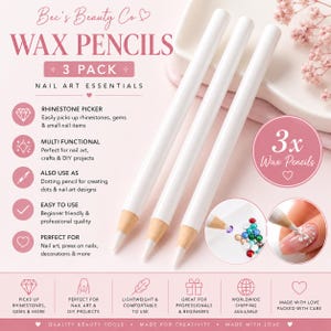 Könnte beinhalten: Drei weiße Wachsstifte für Nailart, mit dem Text "WAX PENCILS" und "3 PACK". Die Stifte sind zum Aufnehmen von Strasssteinen, Edelsteinen und kleinen Nagelartikeln konzipiert. Die Stifte sind auch für Nailart, Basteln und DIY-Projekte.