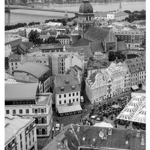 May include: A set of three ceramic mugs with a speckled, matte finish. The mugs are in shades of cream, light gray, and dark gray. Each mug has a simple, minimalist design, perfect for coffee or tea.