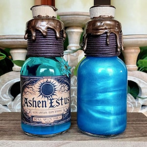 May include: Two glass bottles with cork stoppers and bronze-colored wax seals. One bottle is teal with a label reading "Ashen Estus". The other bottle is blue with a shimmering liquid. Both bottles have dark brown rope around the neck.