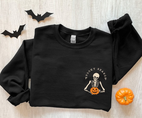 Spooky Season sweatshirt, minimal Halloween sweater, Skeleton pocket sweatshirt, Skeleton graphic sweatshirt, halloween pajamas, tshirt