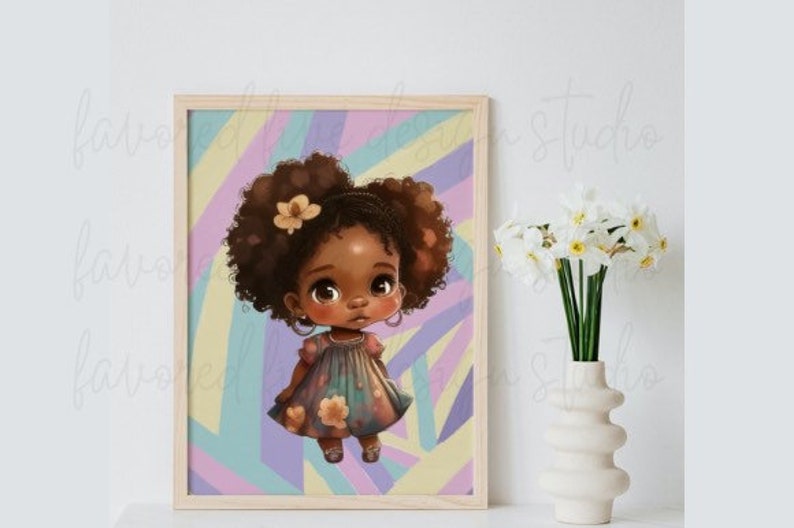 May include: A framed art print featuring a cartoon illustration of a young girl with dark skin and curly brown hair. She wears a floral dress against a pastel rainbow background. A vase of white flowers sits to the right.